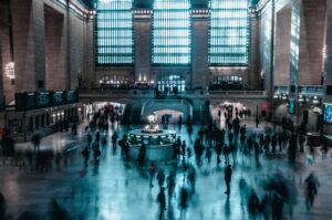A bustling scene of commuters at Grand Central Terminal, New York City, with a sense of motion and urban energy.